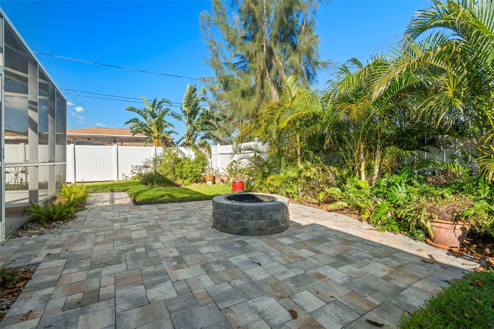 fire pit area outside of enclosed porch