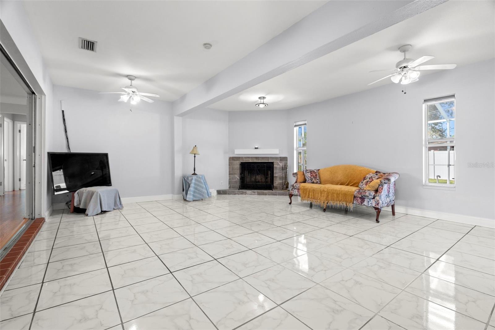 large family room with fireplace