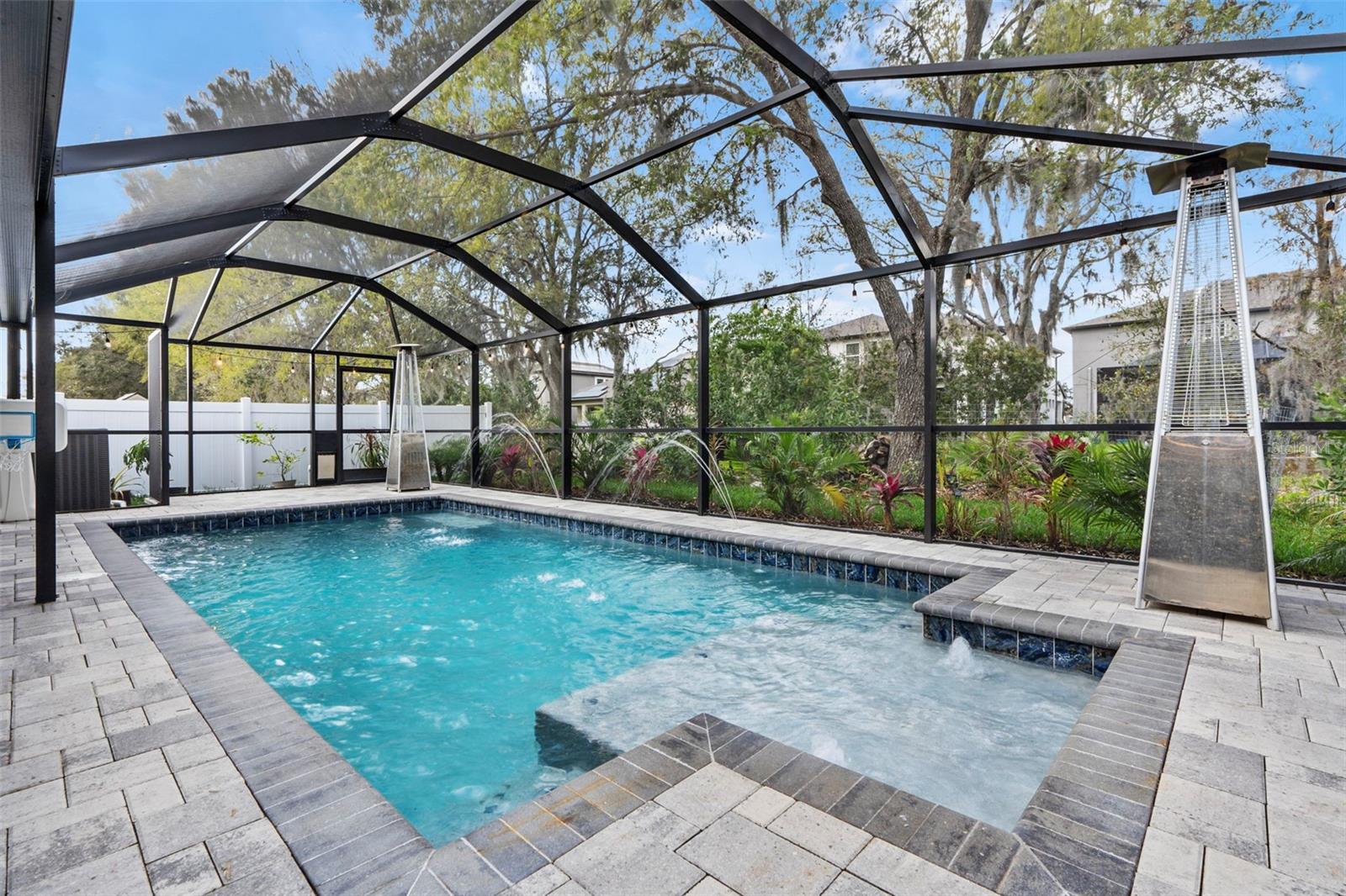 Heated Saltwater Pool with Fun Water Fountains & Pool Cage