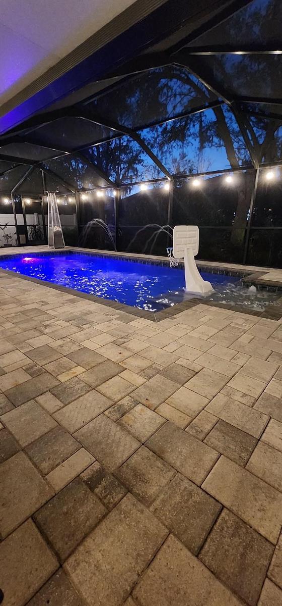 Nighttime photo with pool lights