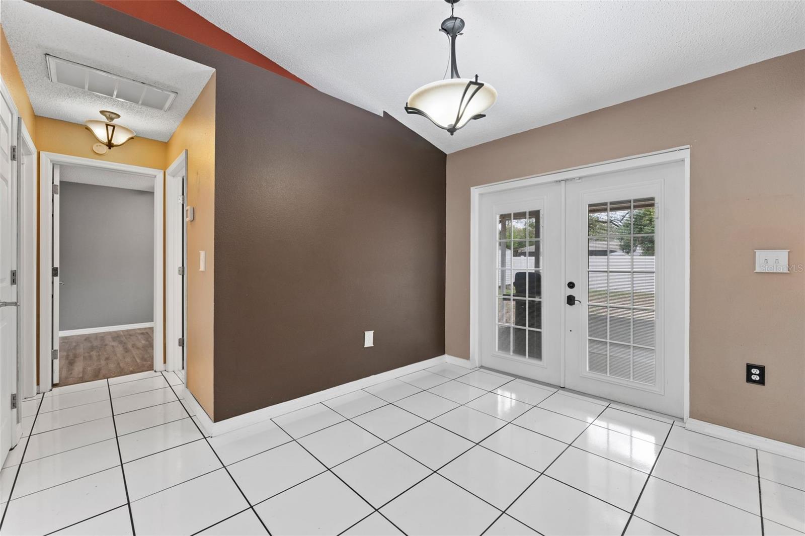 Dining Room/ French Doors to Screened in patio