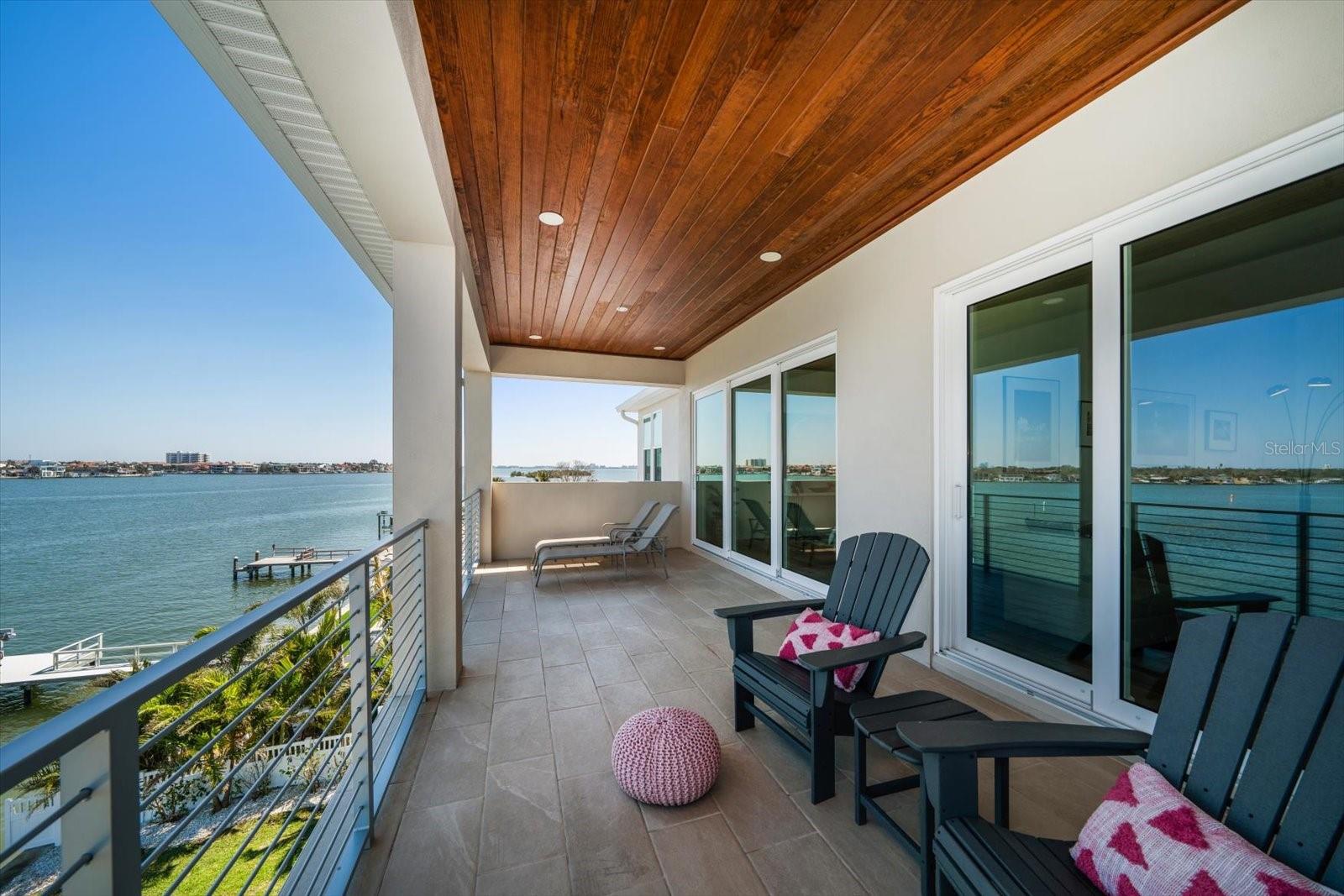 Upper level Family Room balcony and Primary bedoom balcony