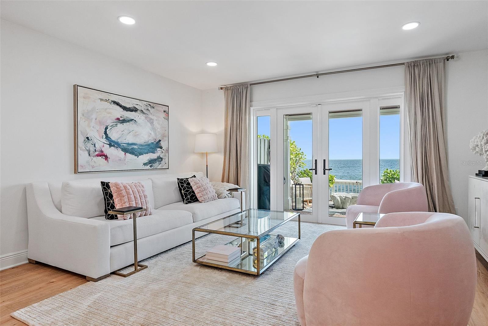 living room with impact double french doors