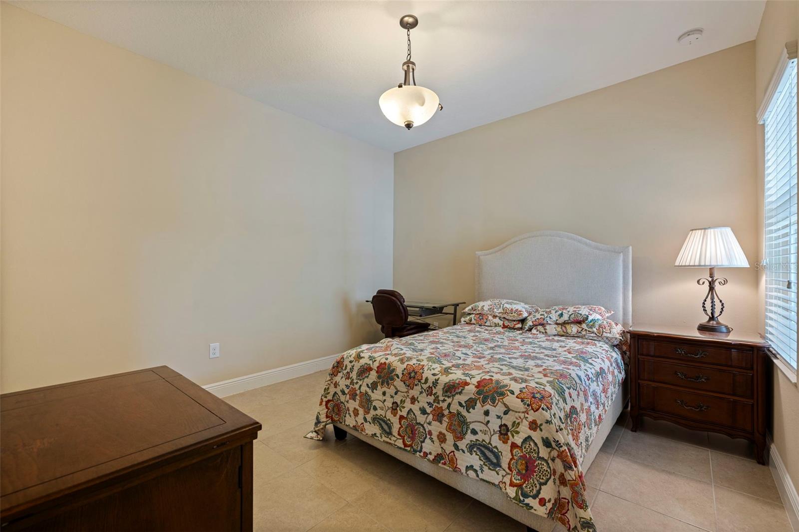 Bedroom 2 with adjacent bathroom