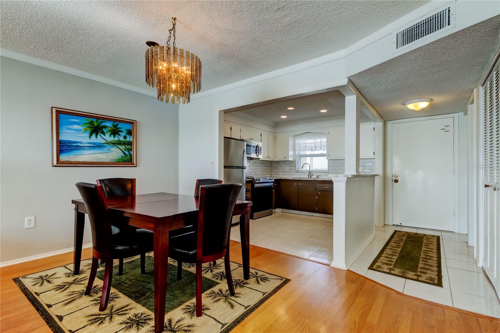 Dining Room into Kitchen and Foyer