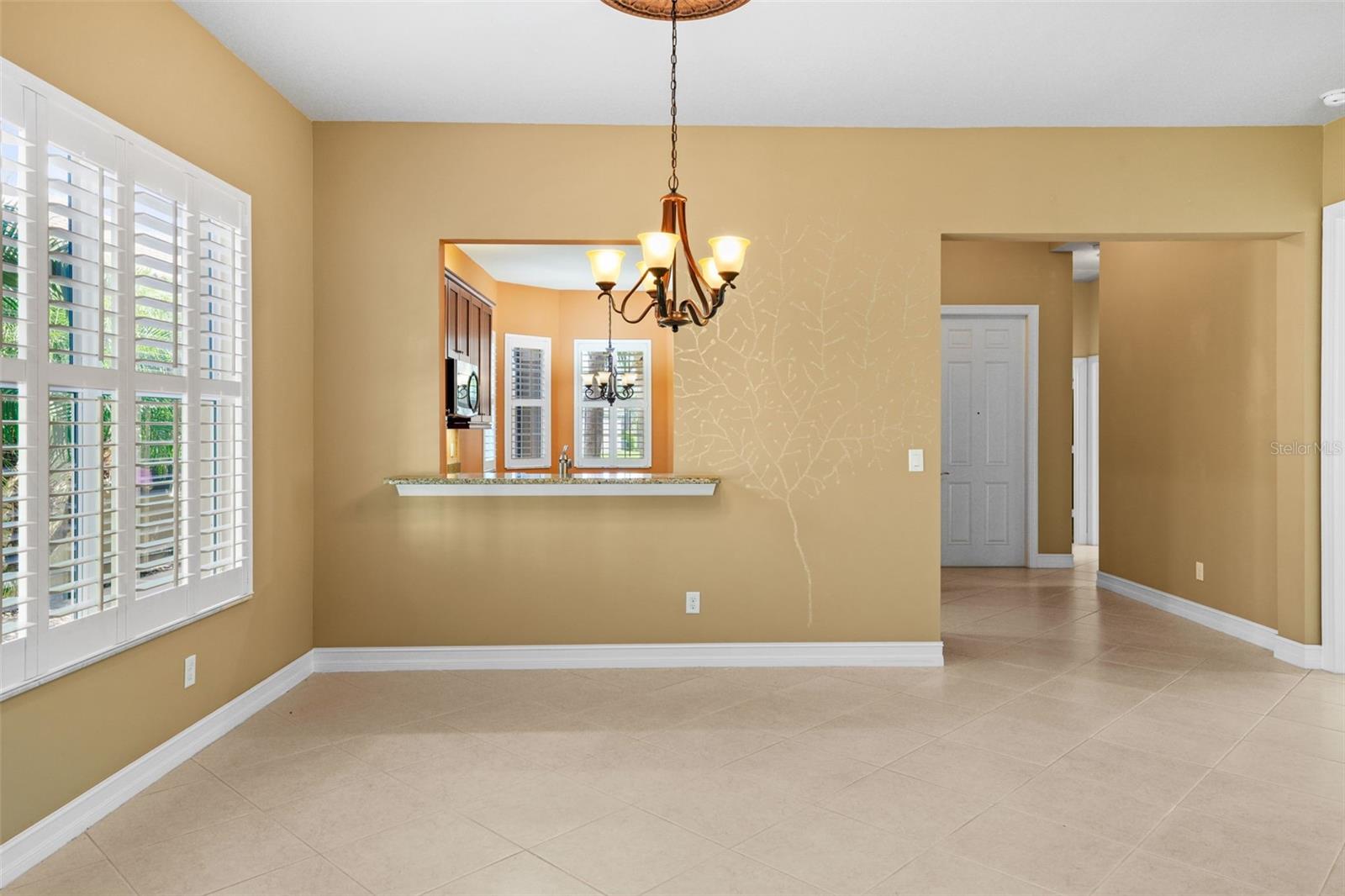 HALLWAY TO KITCHEN AND GREAT ROOM