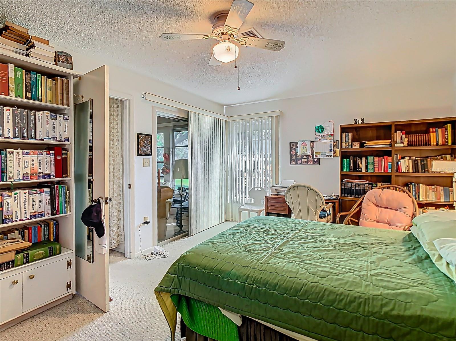 Primary Bedroom with slider to porch