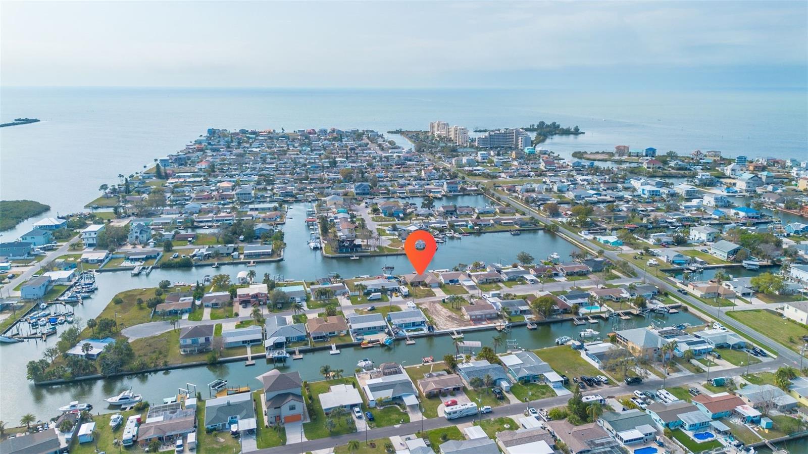 Round red arrow is pointing to the location of this large, expansive and beautiful home!