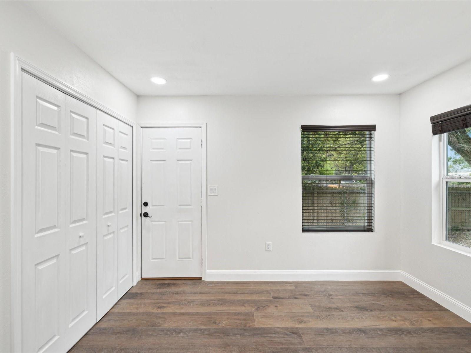 Back door, laundry closet and flex space/bonus room