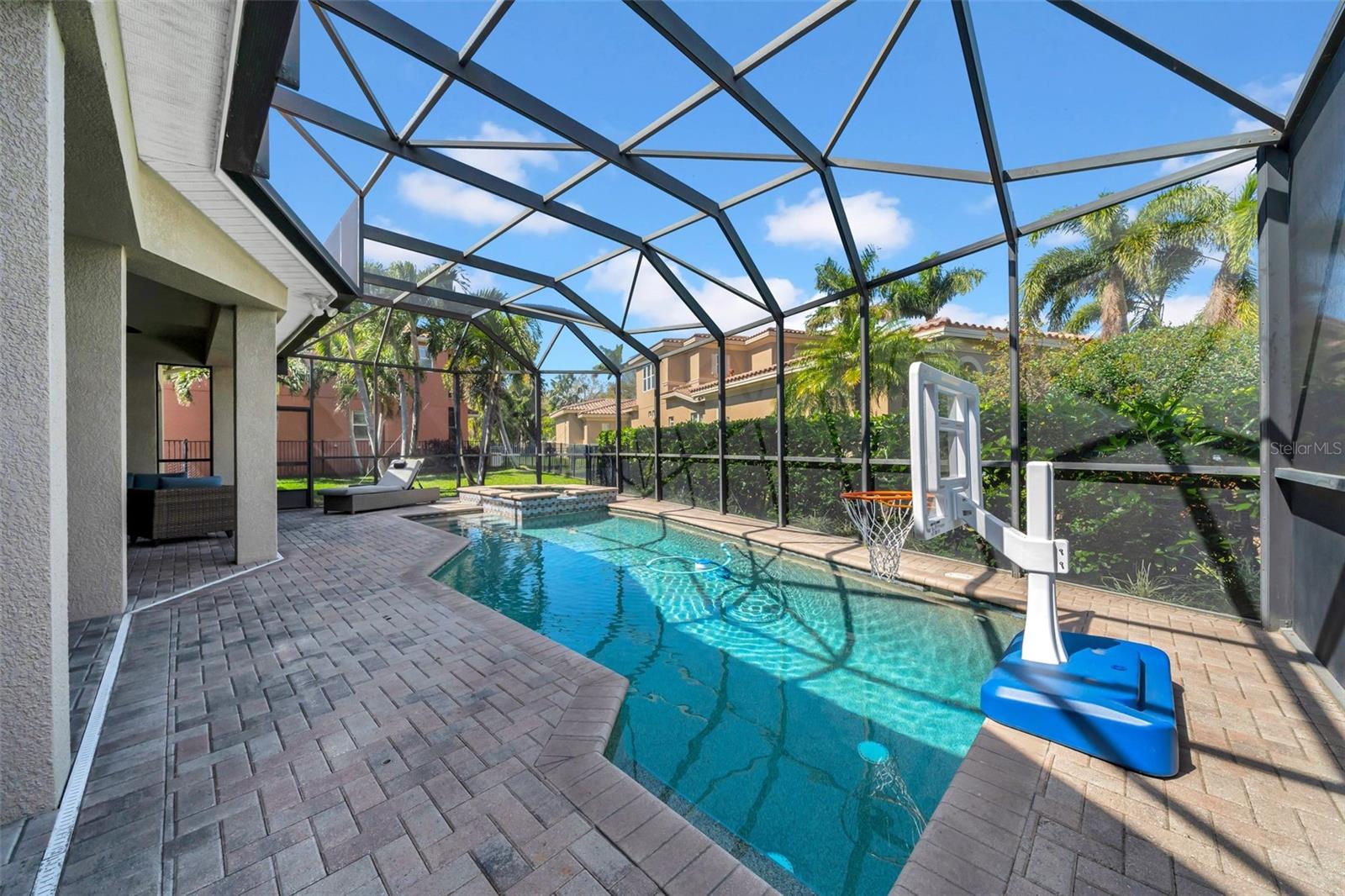 Enclosed pool with heated spa