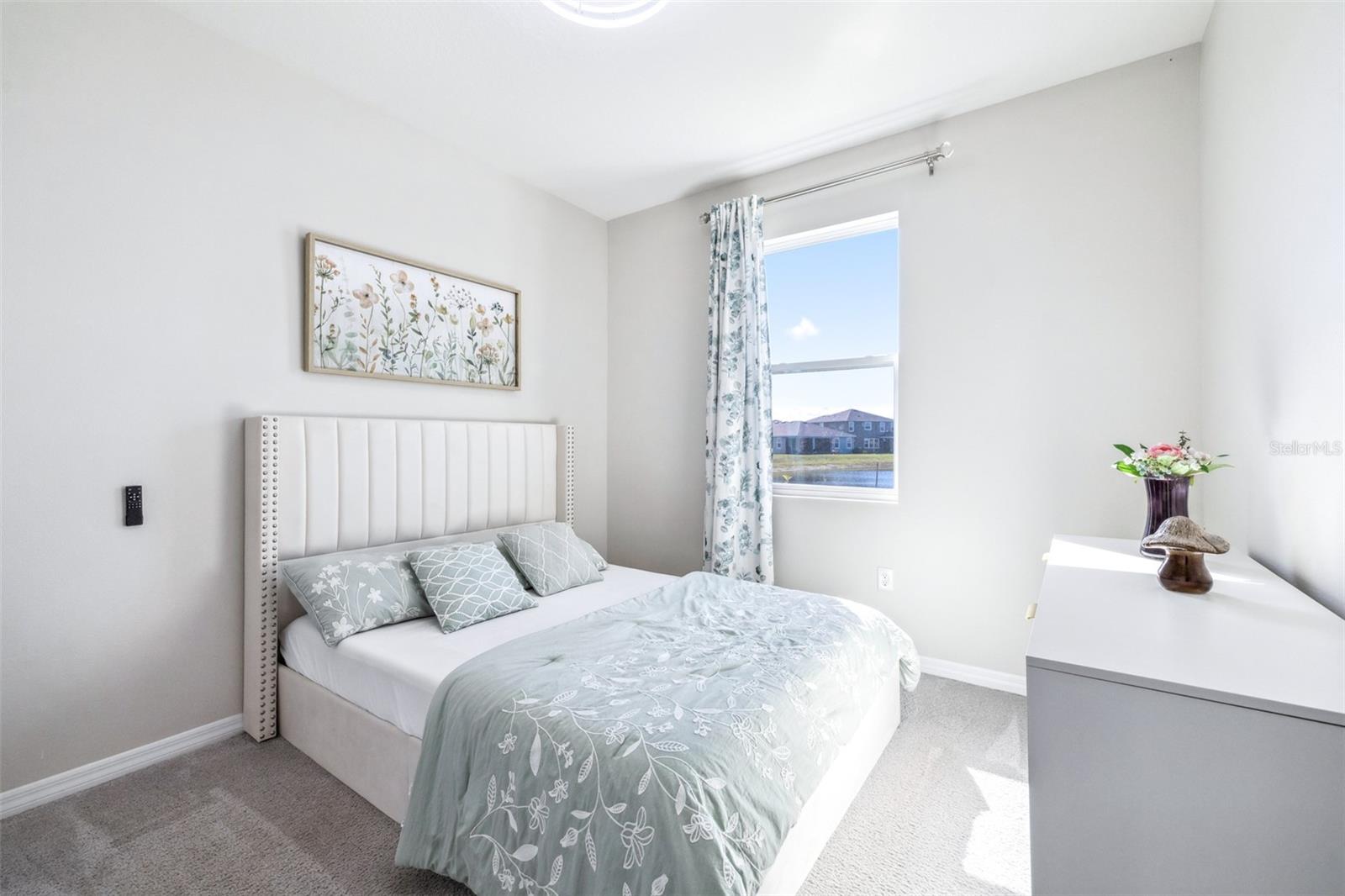 First floor bedroom overlooking the pond