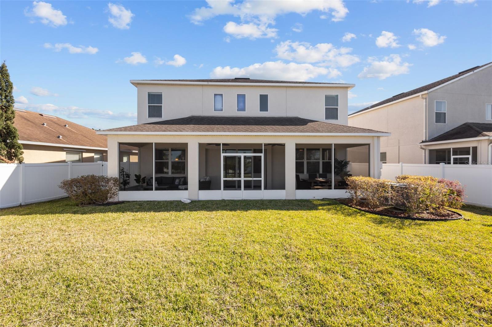 Rear porch is full width of home for plenty of outdoor space