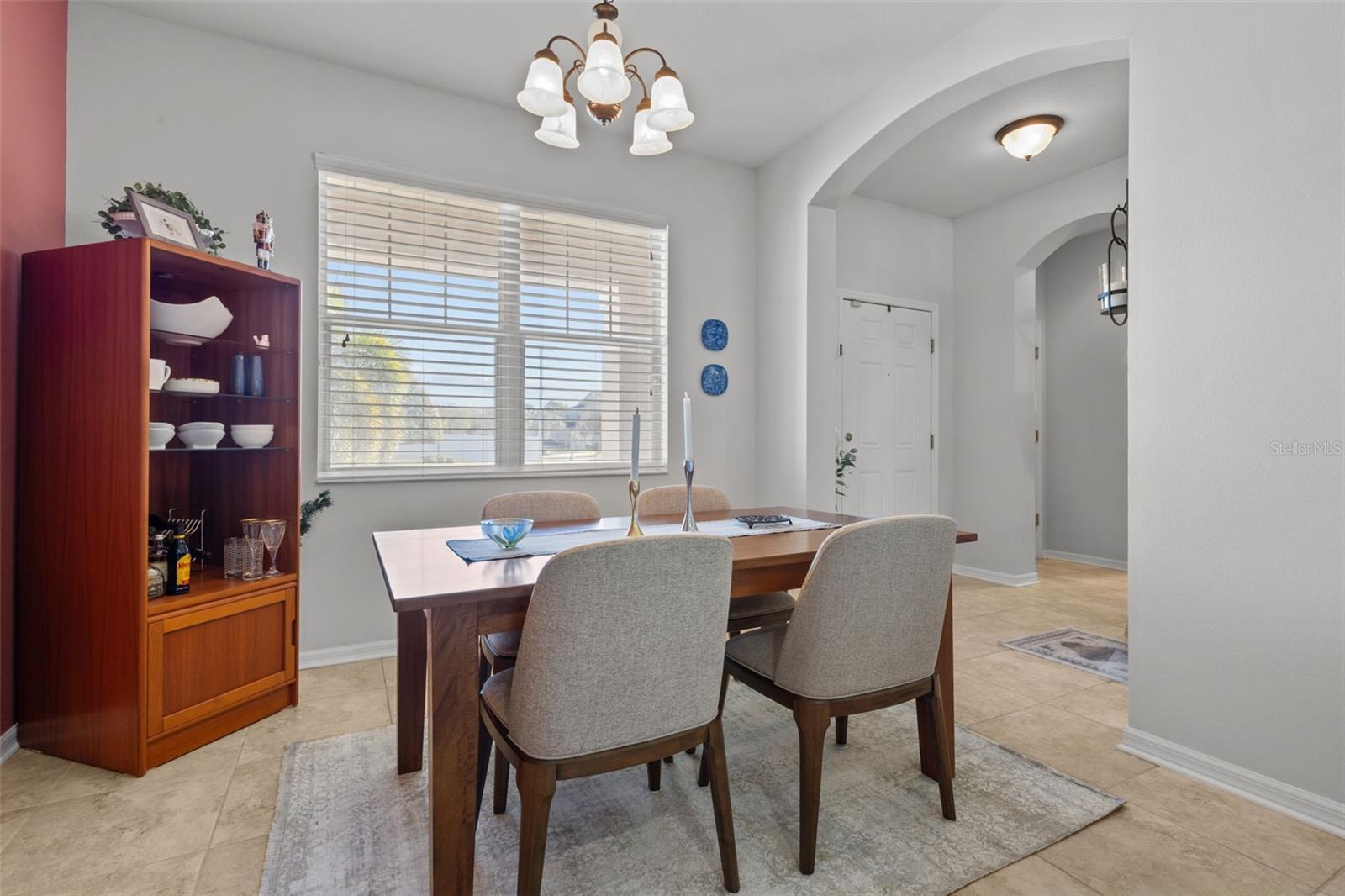 Enter to foyer facing dining room