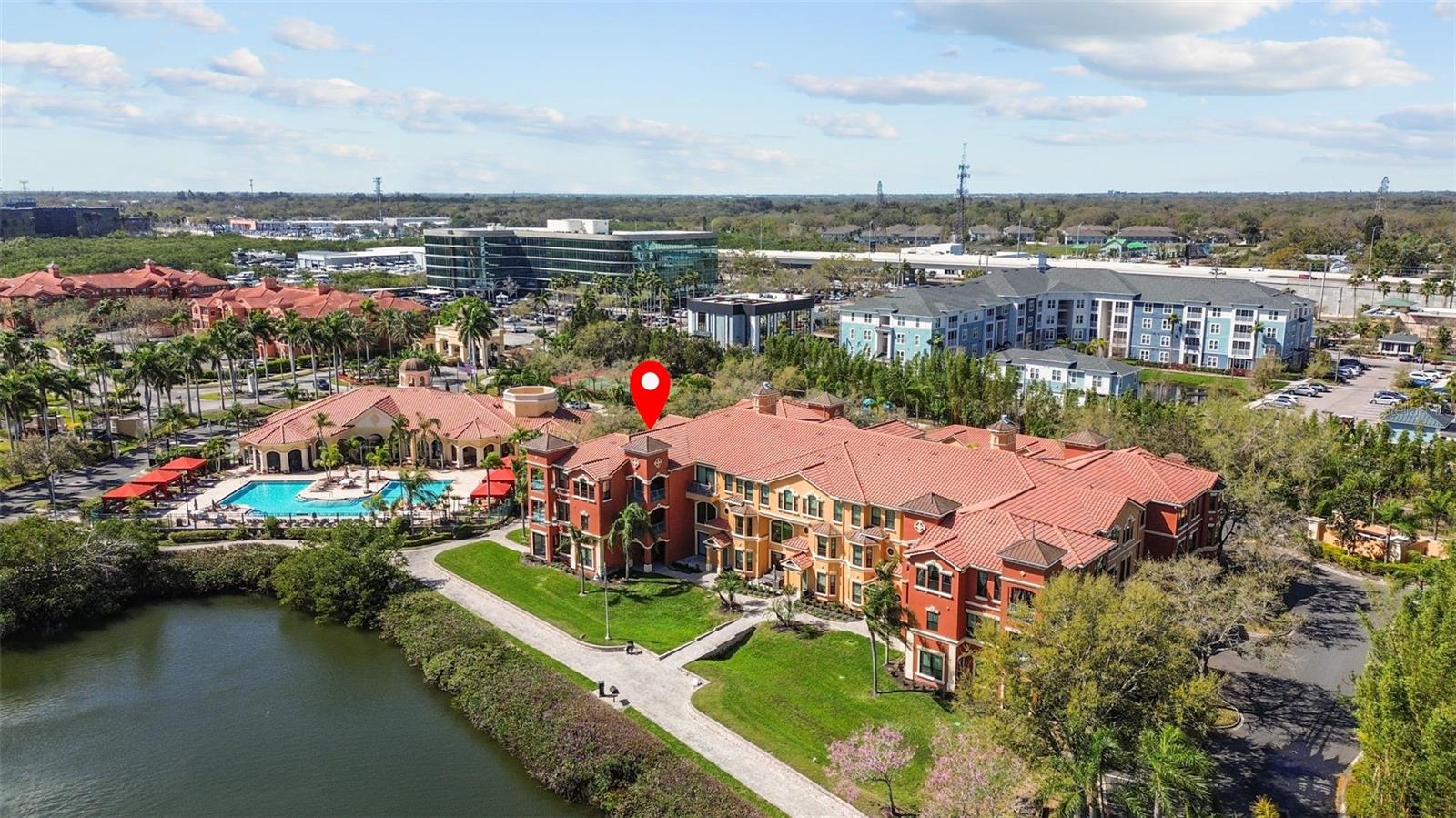 Building 5, adjacent to pool and clubhouse; waterfront walking path