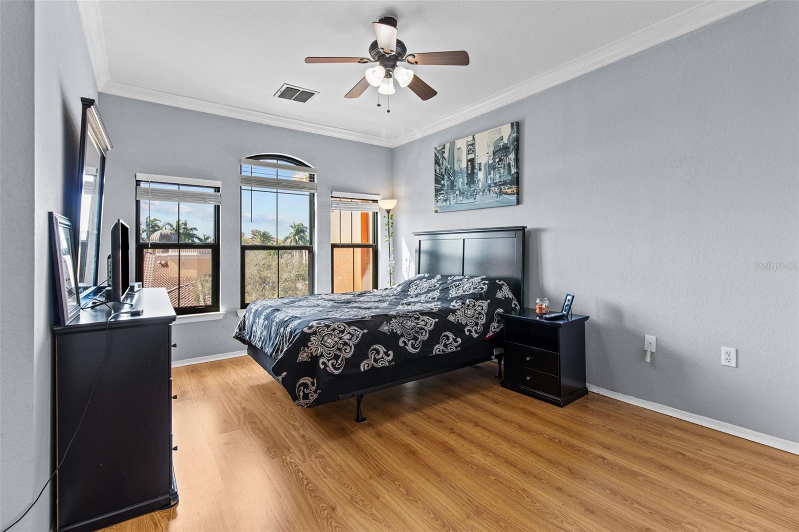 primary bedroom with pool views