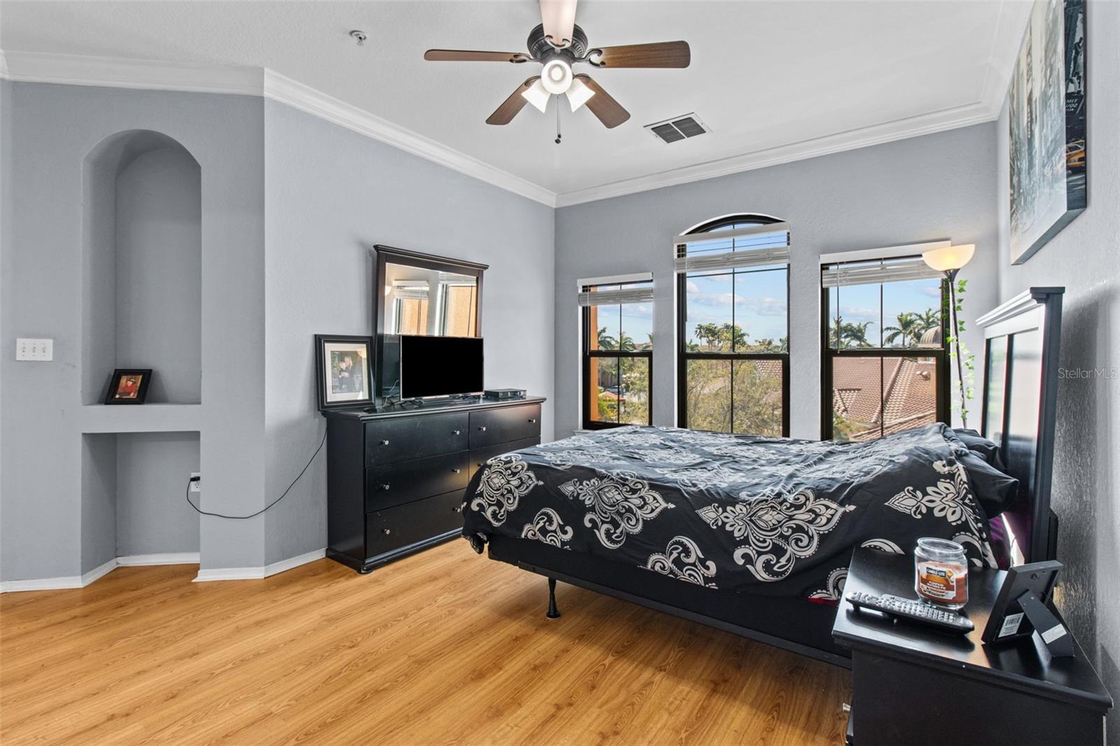 primary bedroom with pool views