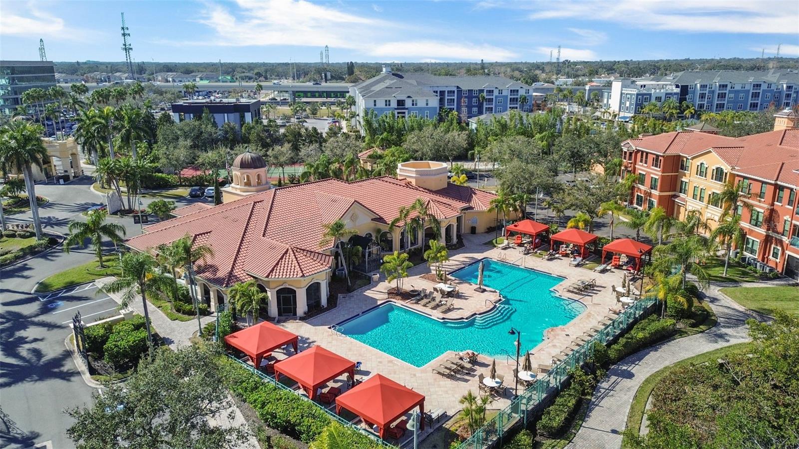 Resort-style pool and building 5