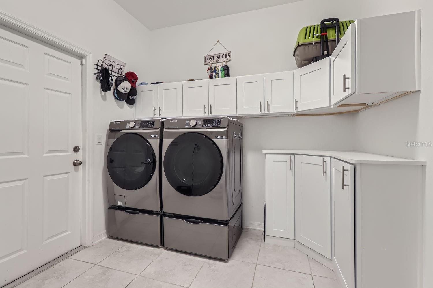 --  High-End Upgrade - Large Laundry Room w/ Custom Built-Ins plus Extra Storage Room (not pictured)  --