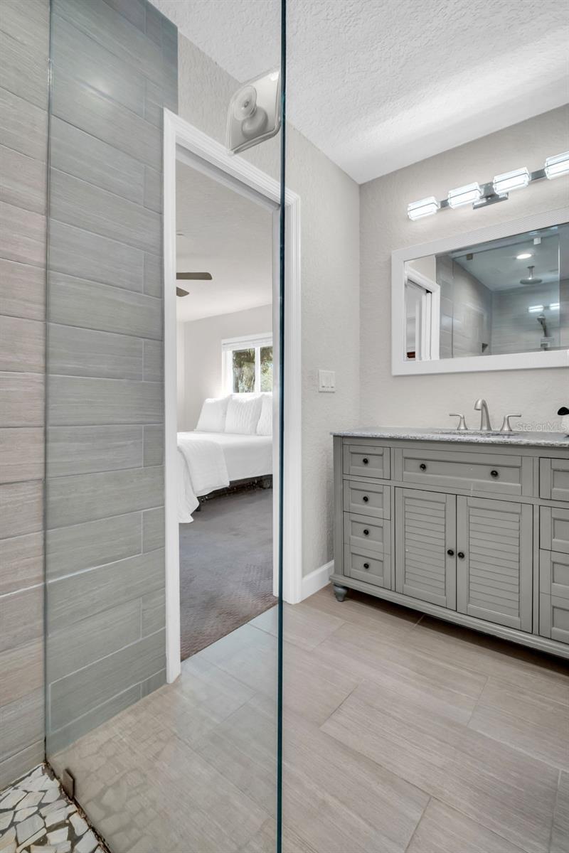 Stone countertops, great vanity storage, and a perfectly designed water closet for privacy~