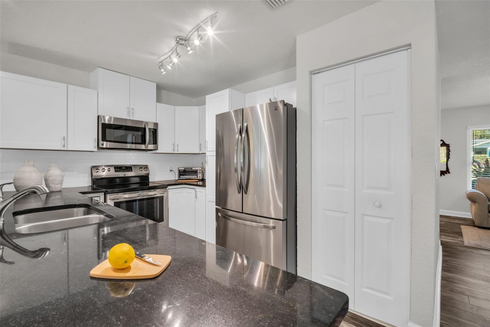 Wonderful cabinet space with both a built-in pantry & walk-in pantry closet~