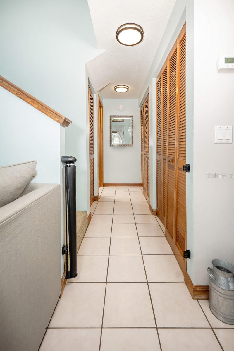 Hallway leading to main bedroom and bathroom