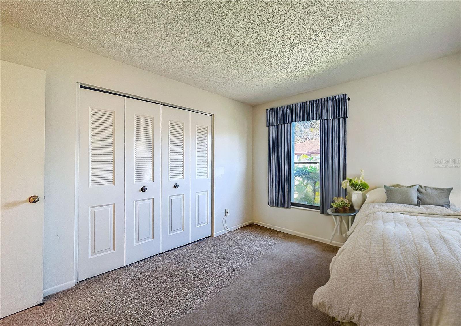 Virtually staged front bedroom