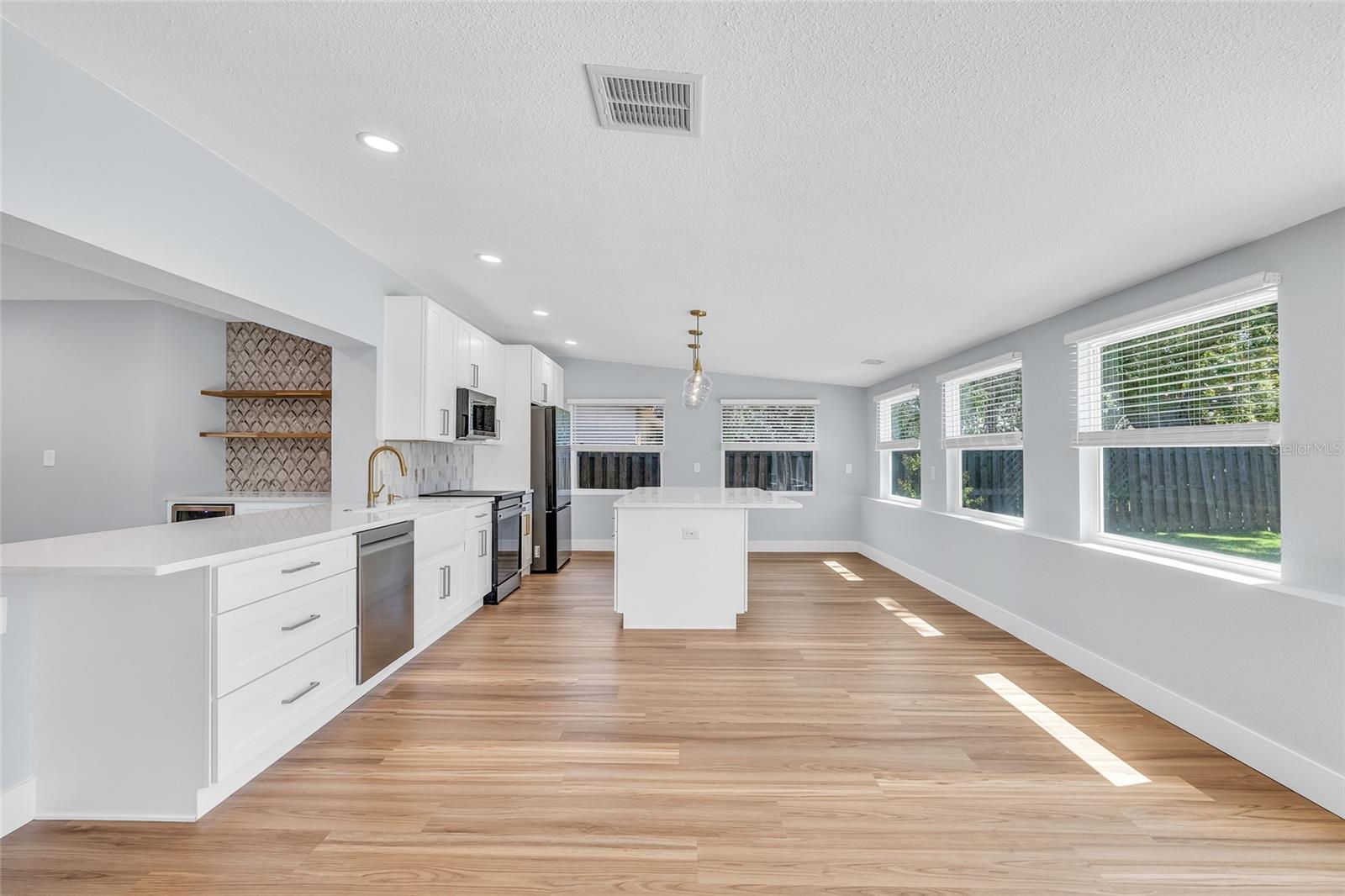 Ample Kitchen Storage with Pantry and Double Sided Cabs on Island