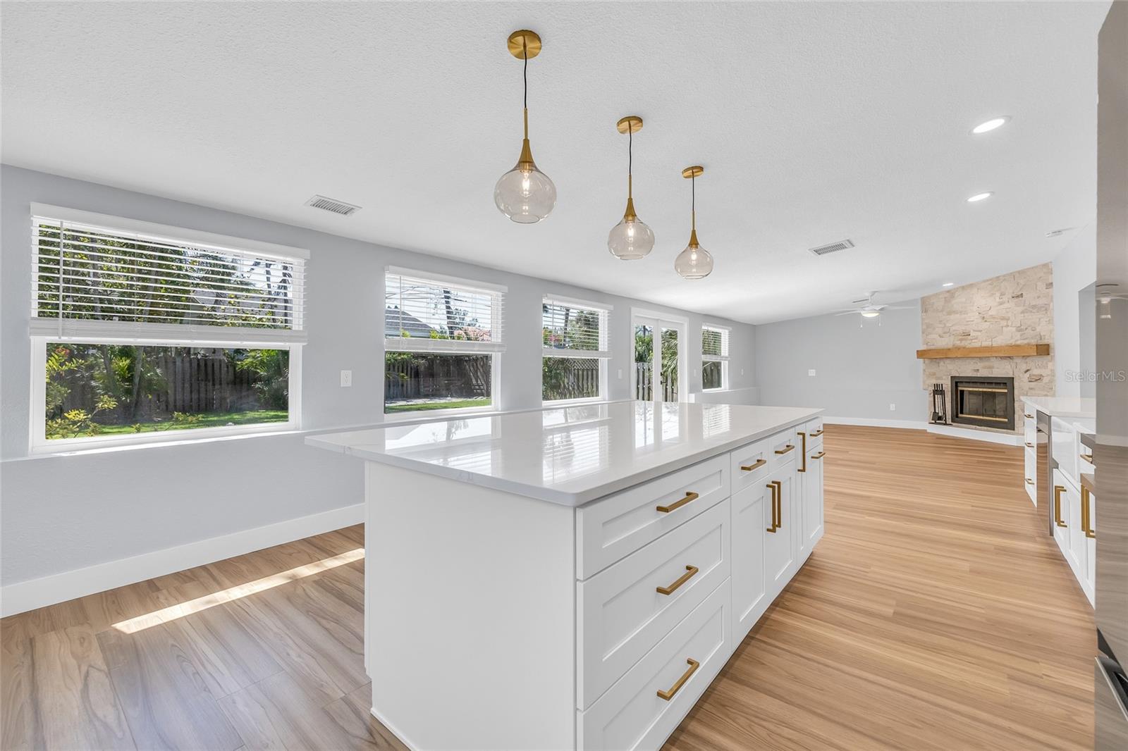 Custom Kitchen Island with Quartz Top and Double Sided Cabinets