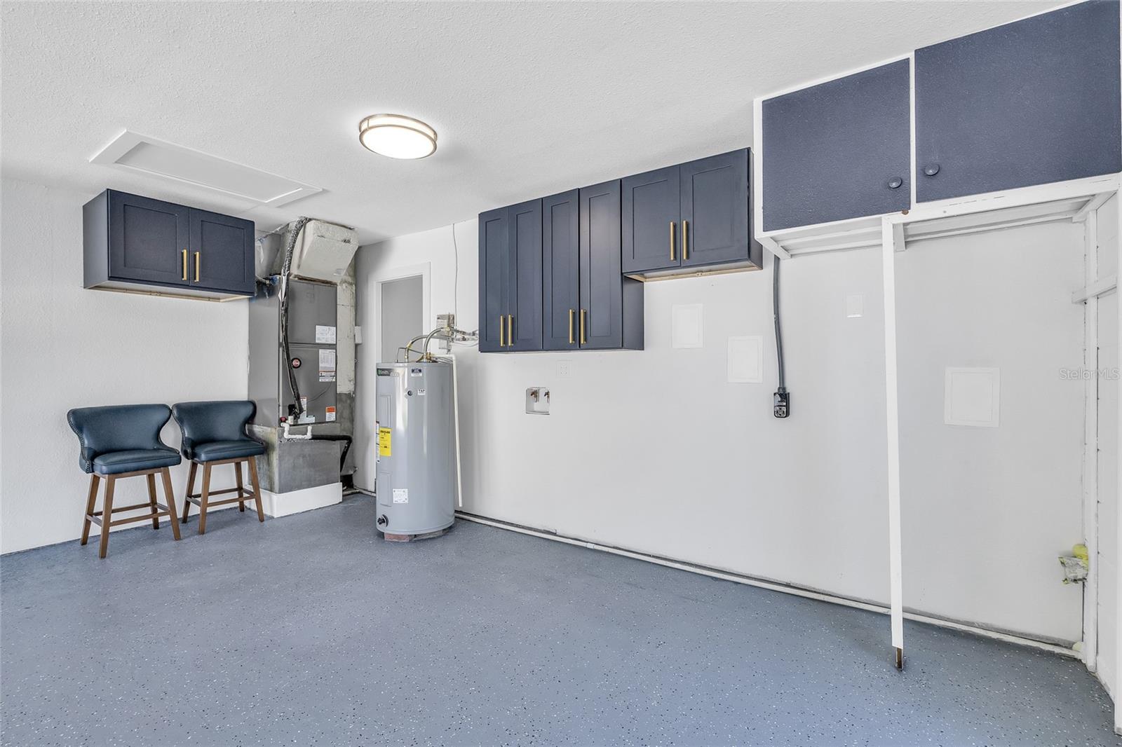 Laundry with Cabinets for Storage