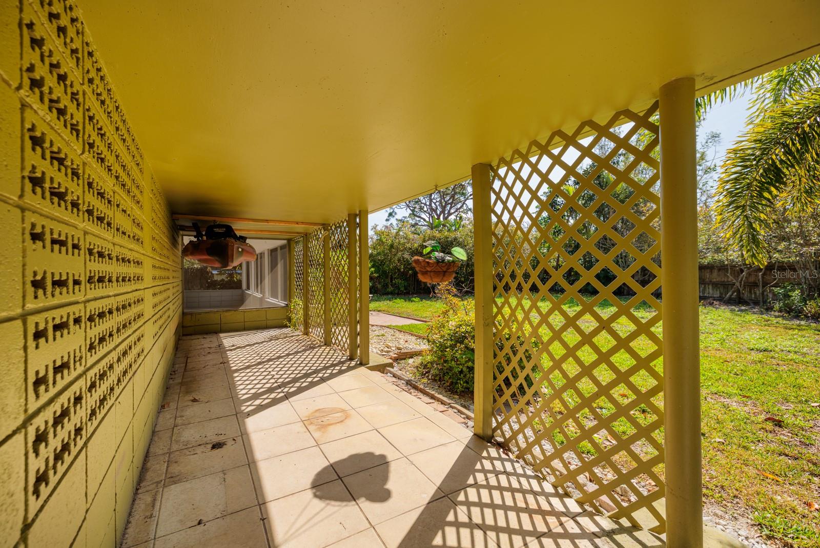 Covered patio with open cement blocks