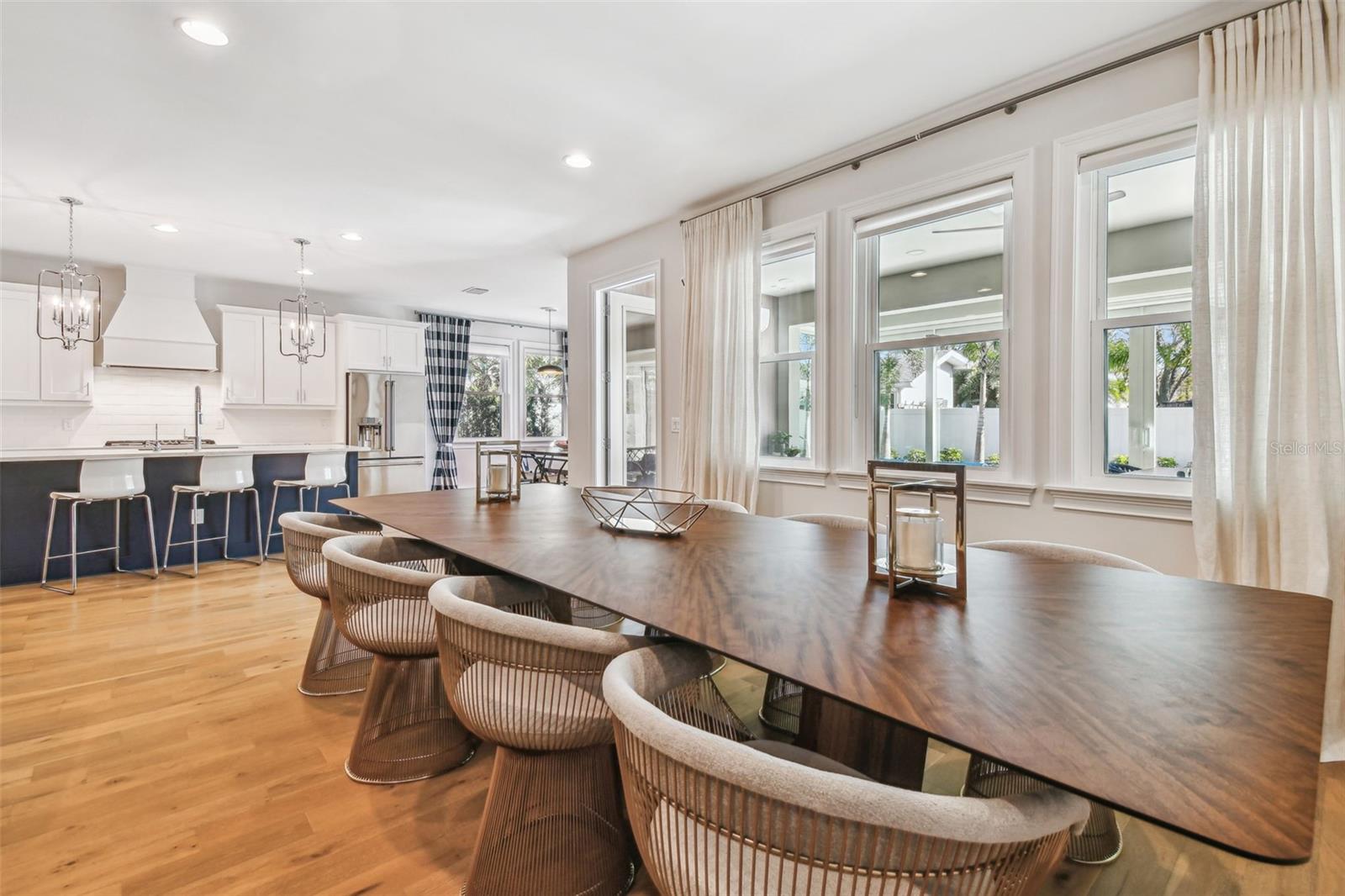 Living area used as dining room that opens to Florida room