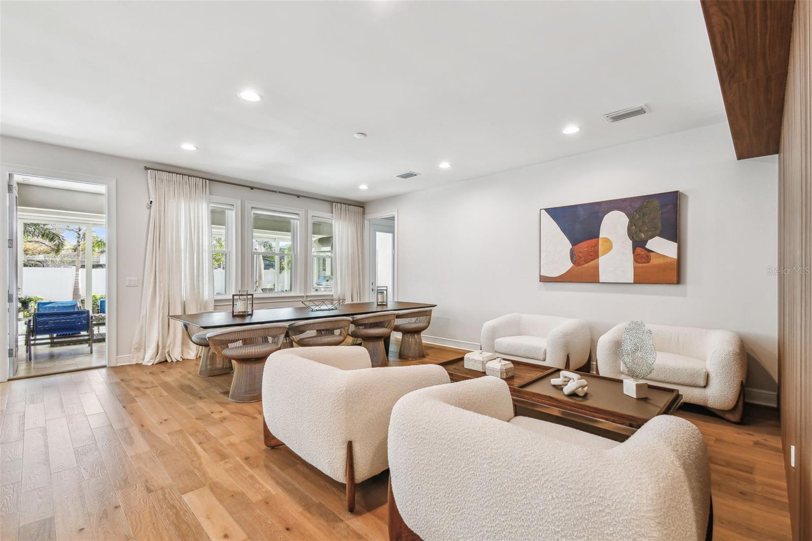 Beautiful living room that opens to enclosed lanai.