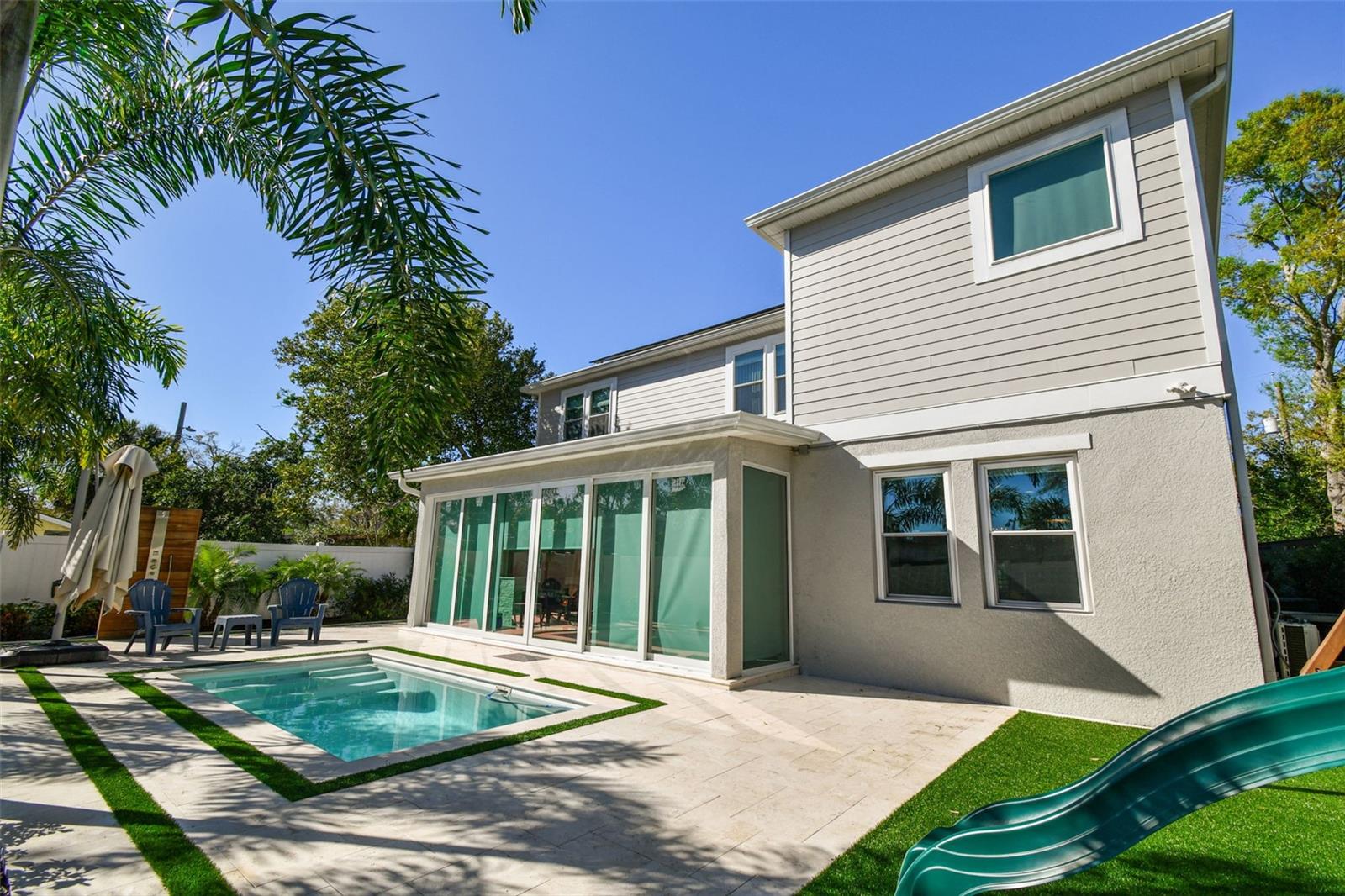 Heated pool travertine deck