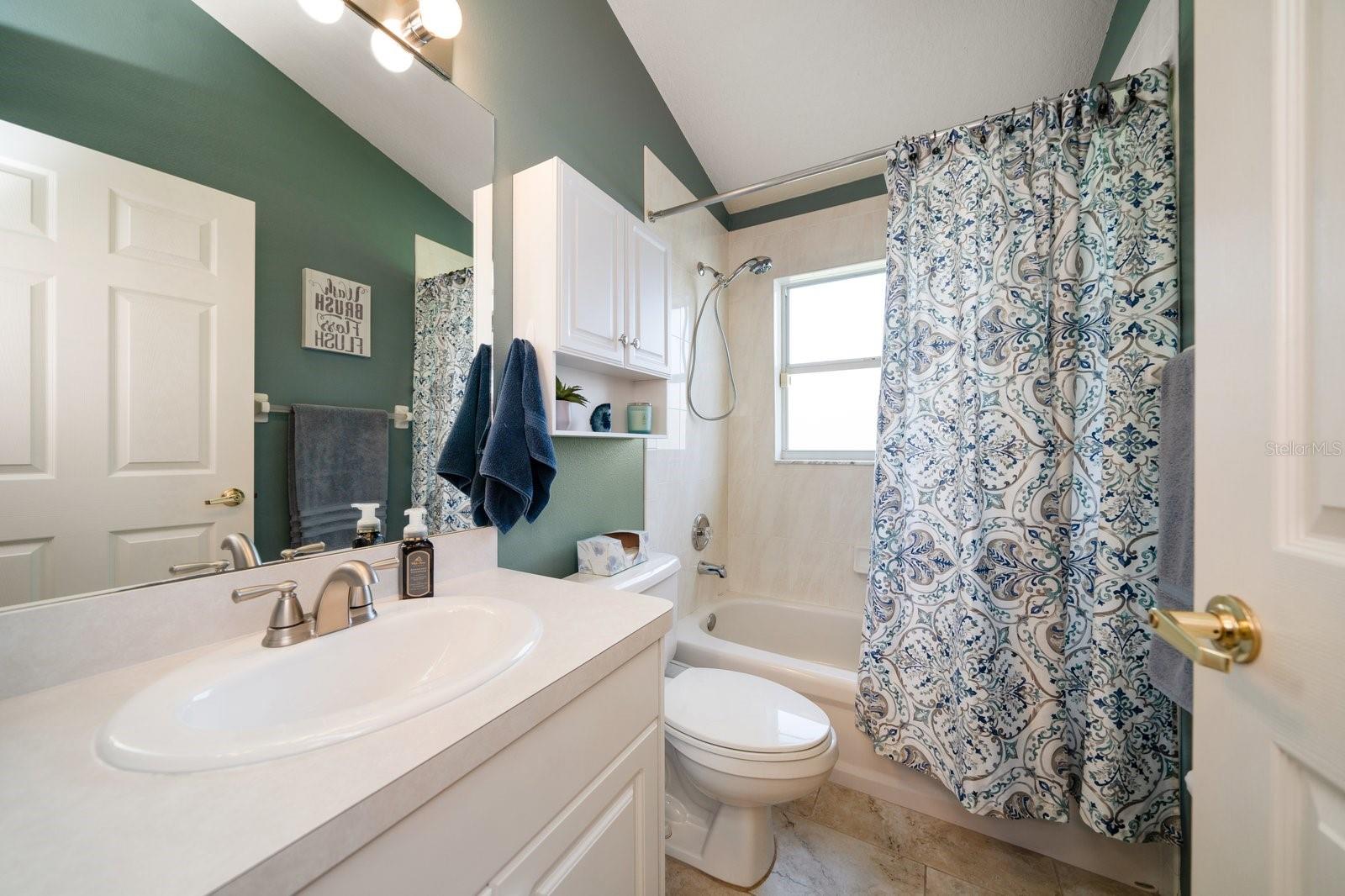 guest bath with tub/shower combo