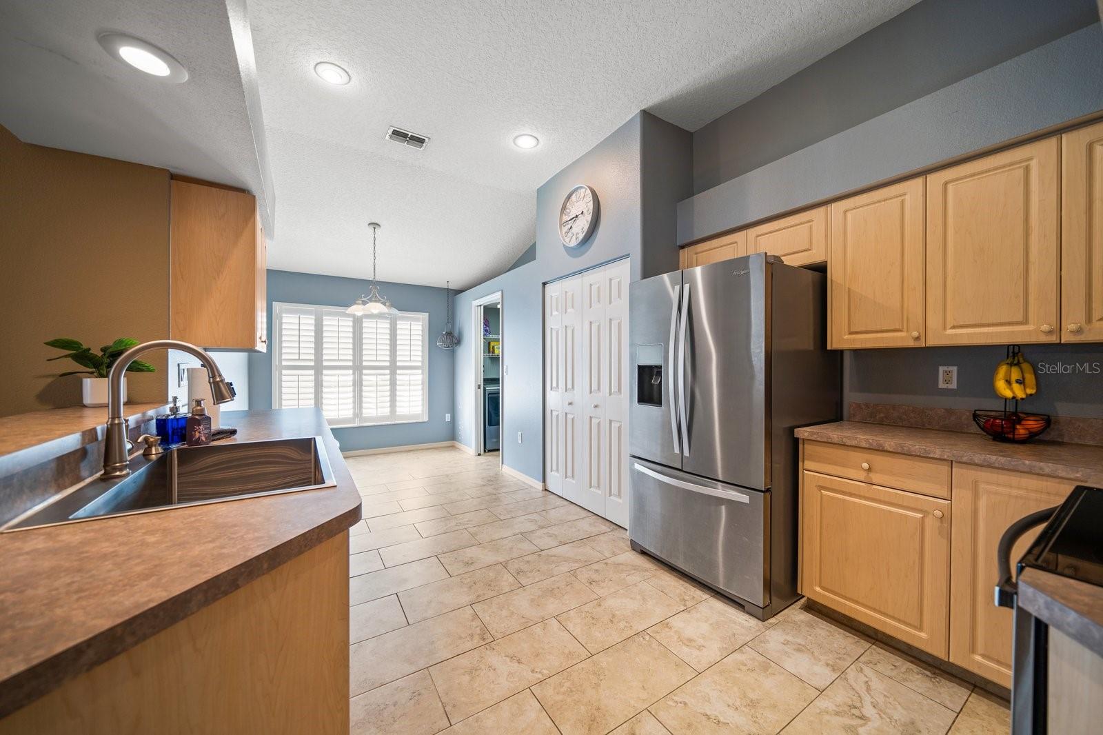 Kitchen with casual eat-in area