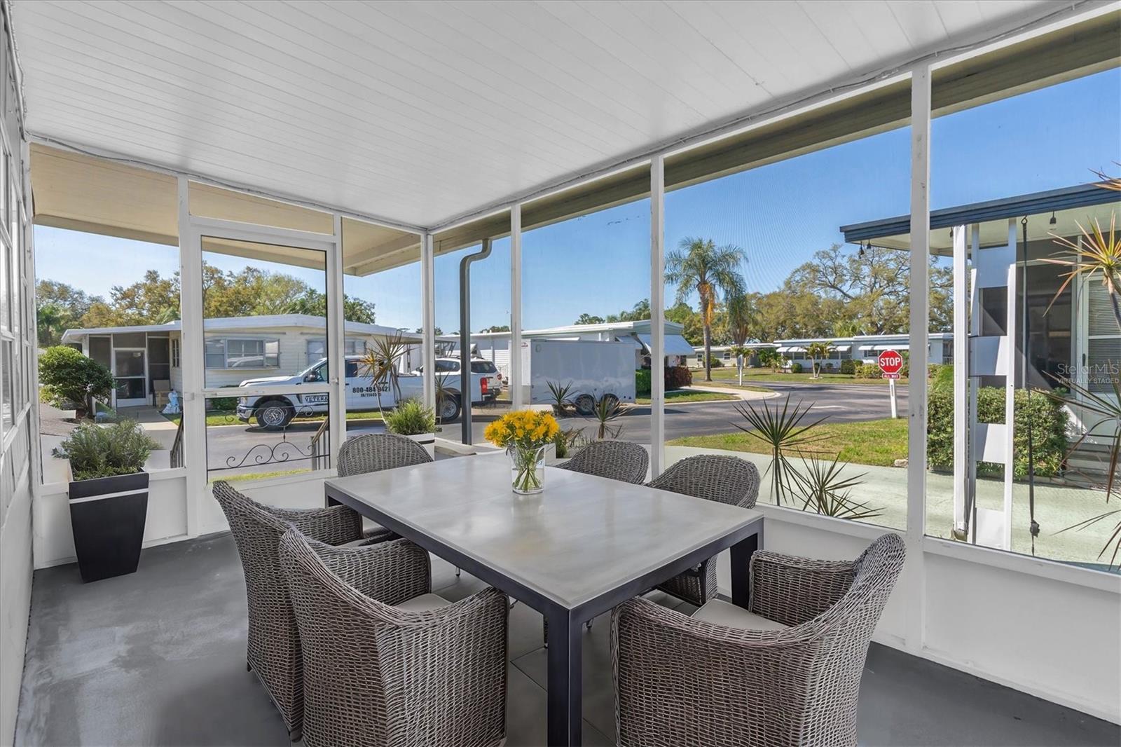 Virtually staged - screened patio # 1 - same level as the home