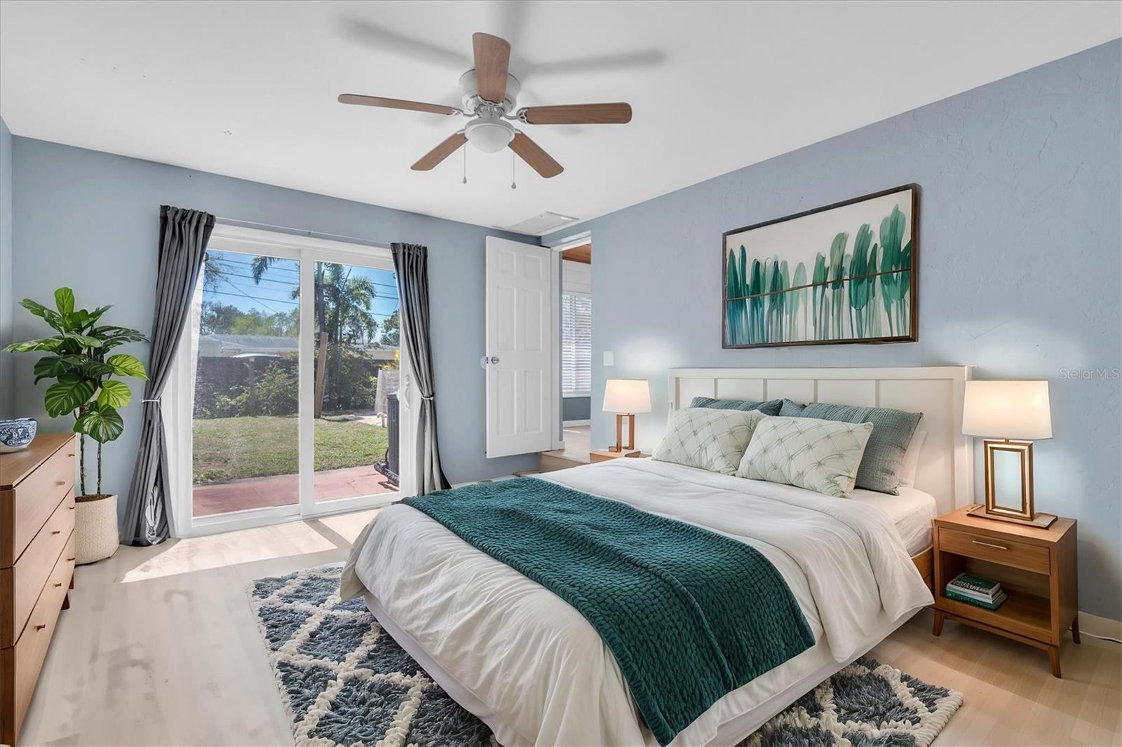 Virtual Staged - Primary Bedroom - acess to the pool