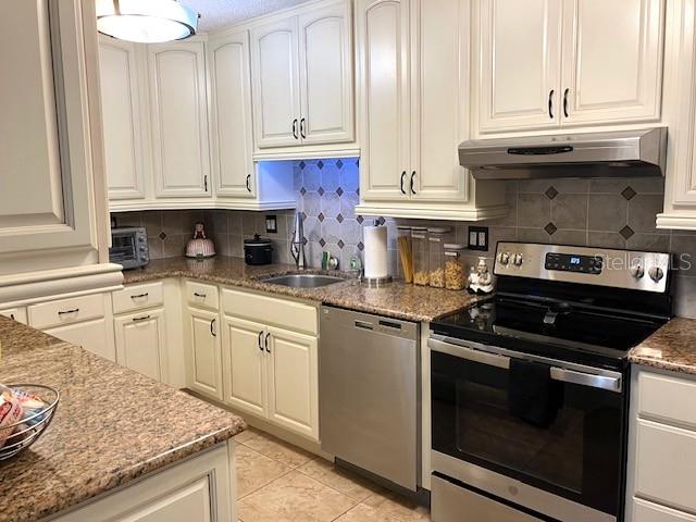 granite counters and CraftMaid cabinets