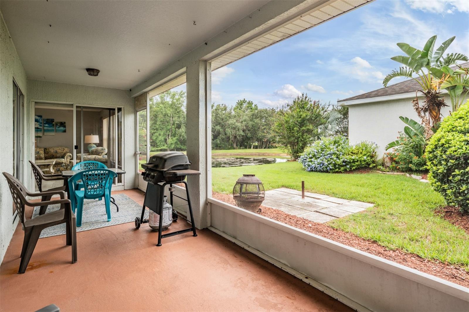 Screened lanai to relax with pone/conservation views and back open patio for fire pit!