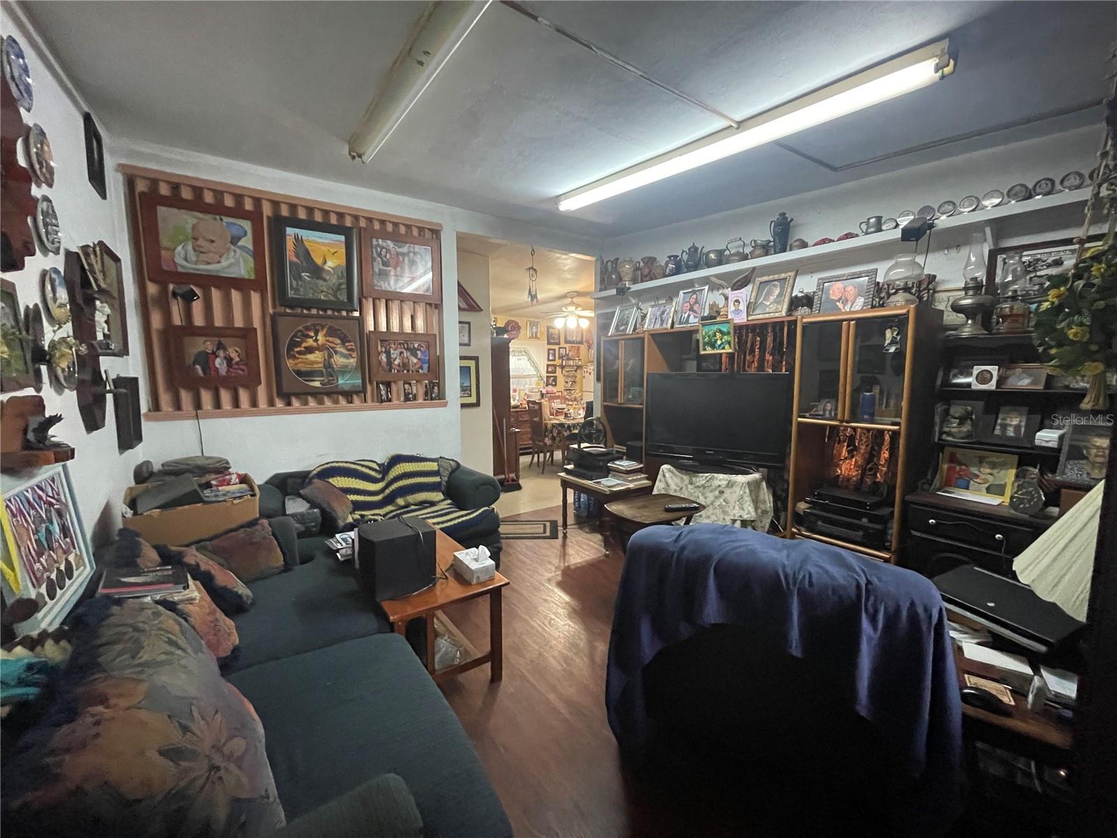 LIVING ROOM HAS A HIGH CEILING