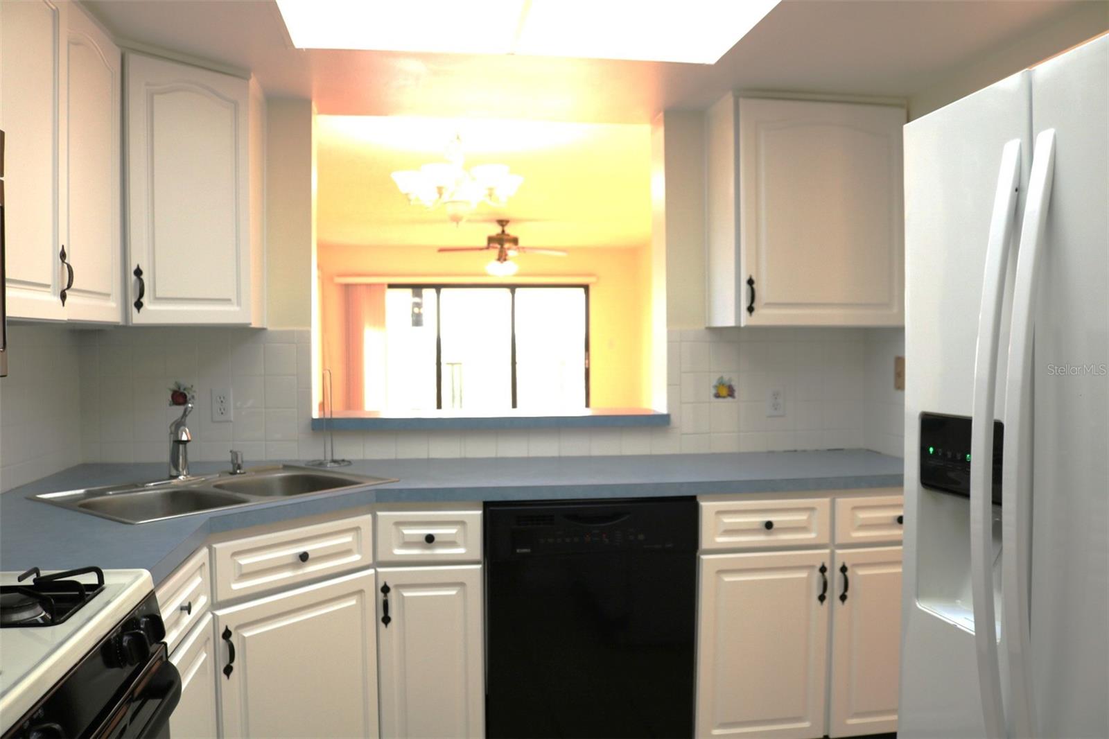 Kitchen with view to living room