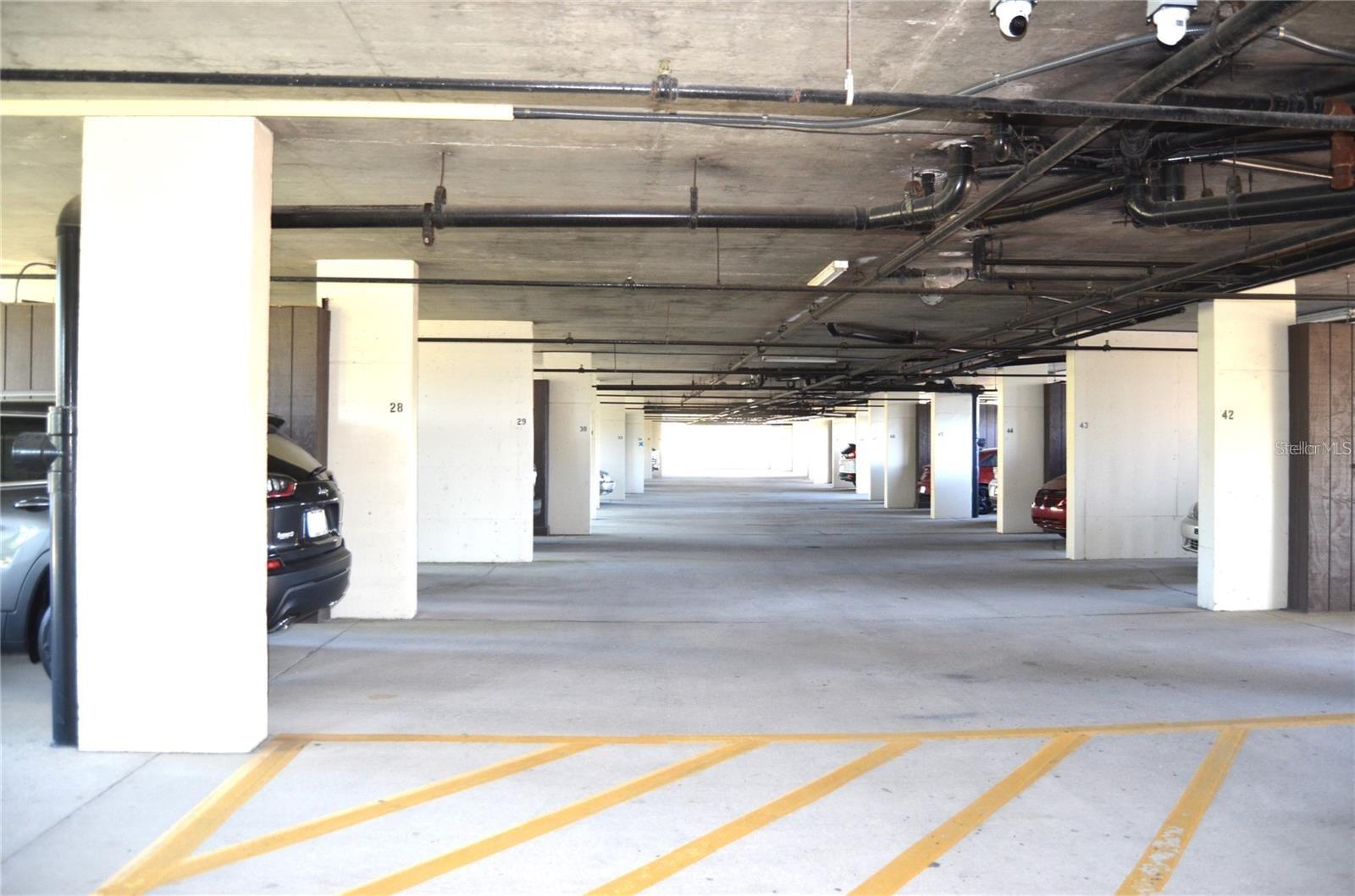 Covered parking underneath the building