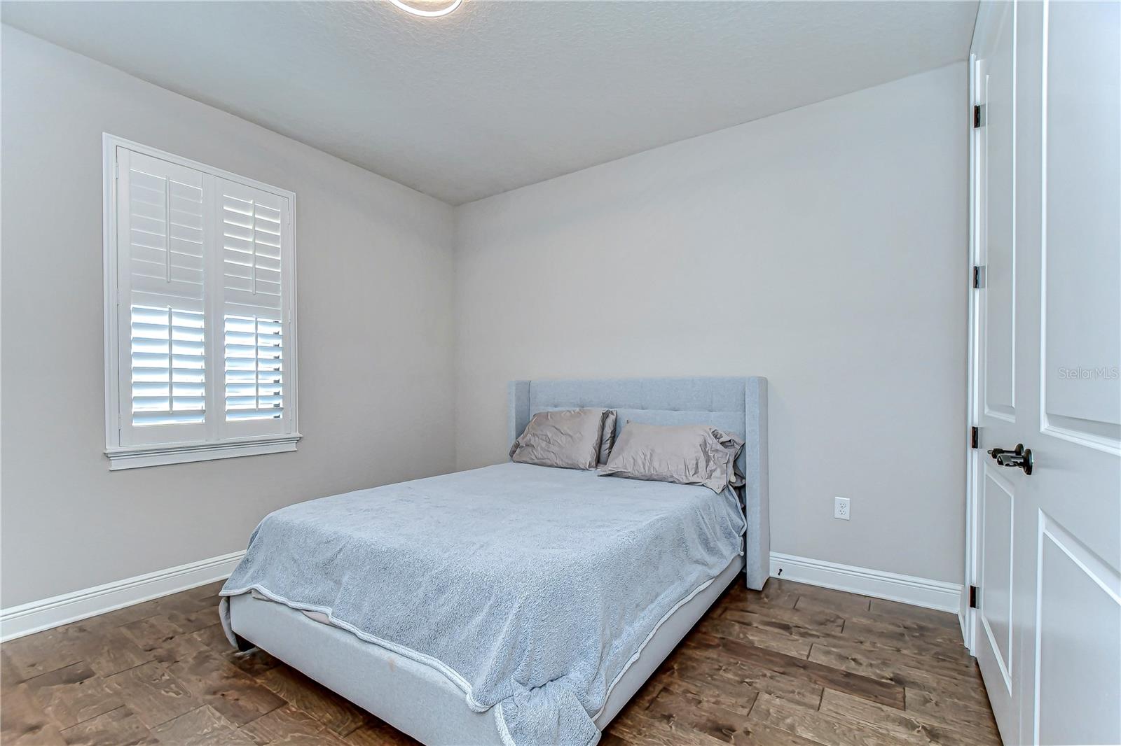 Sink into tranquility in this chic bedroom