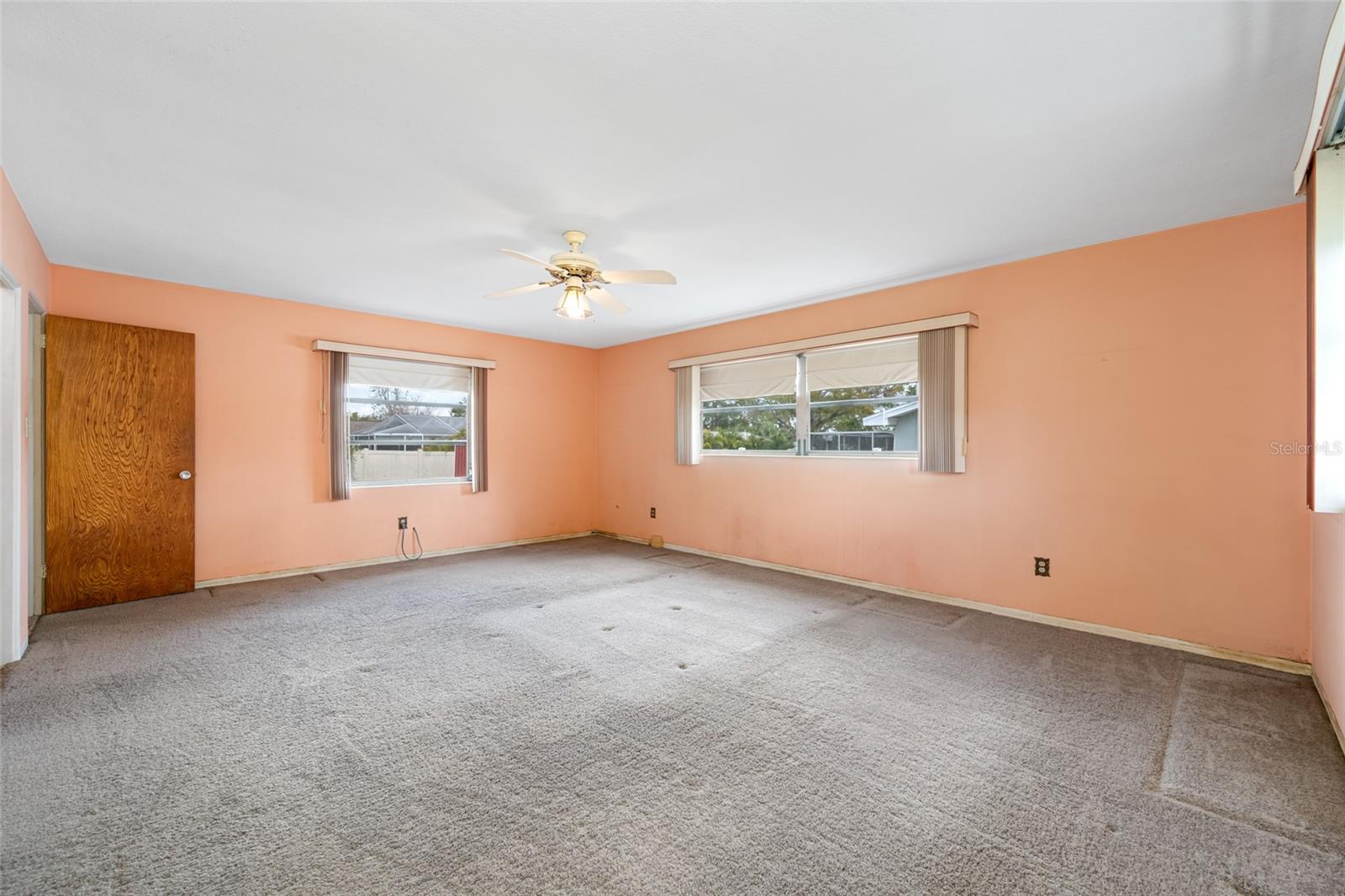 Primary Bedroom with 3 Built in Closet areas.