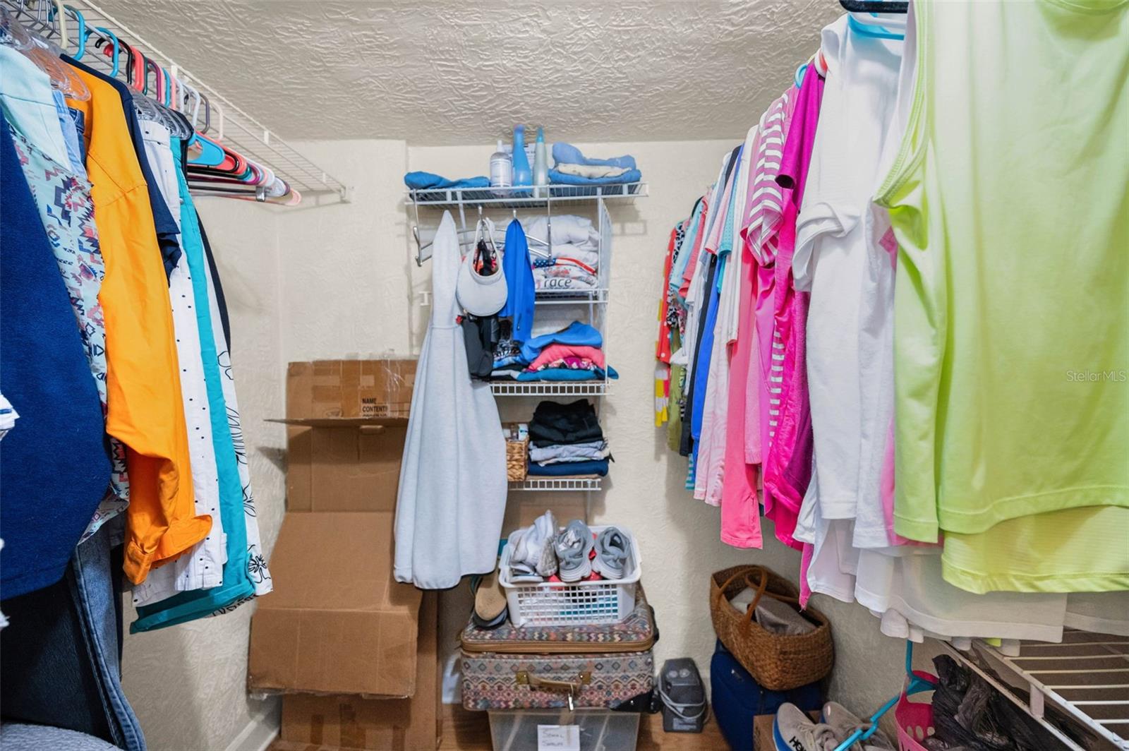 WALK IN CLOSET IN THE PRIMARY BEDROOM