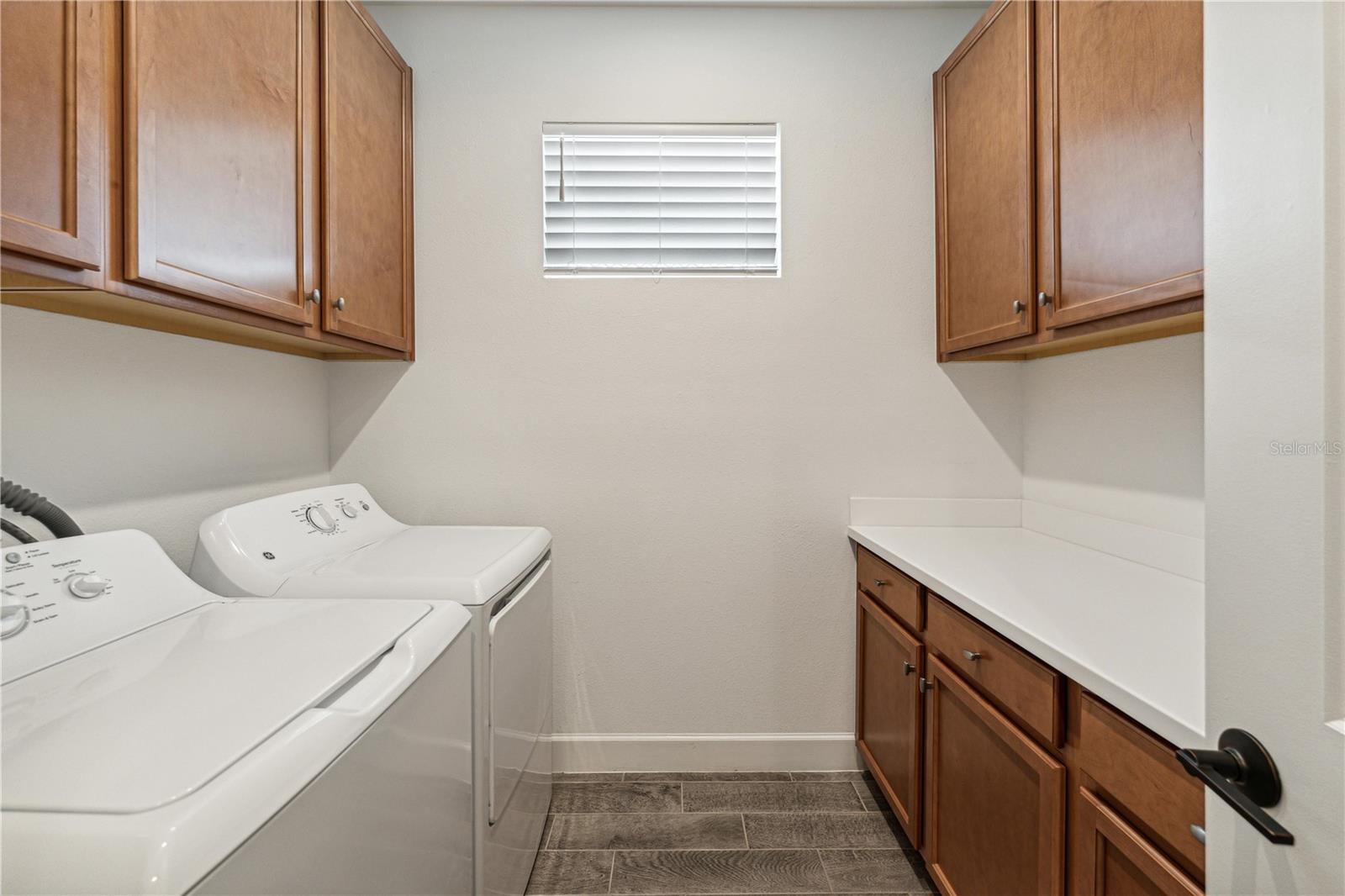 Pantry pull-out cabinets in laundry room