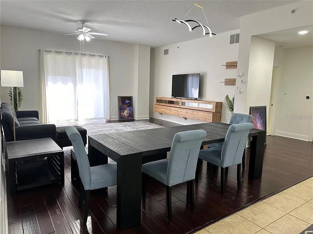 Very spacious living/family room with balcony overlooking the city