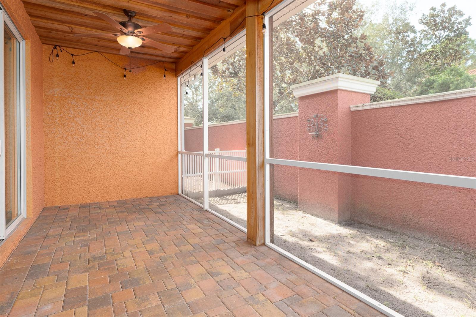 Enclosed patio with pavers