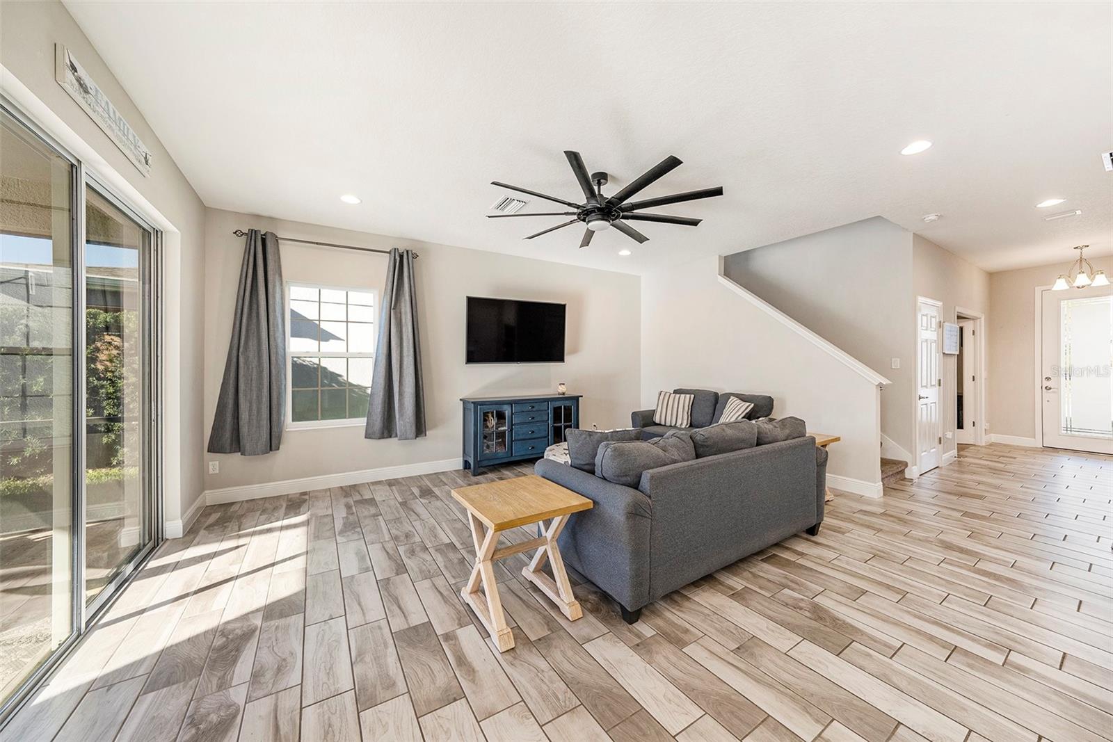 Family room with giant sliders to pool lanai!