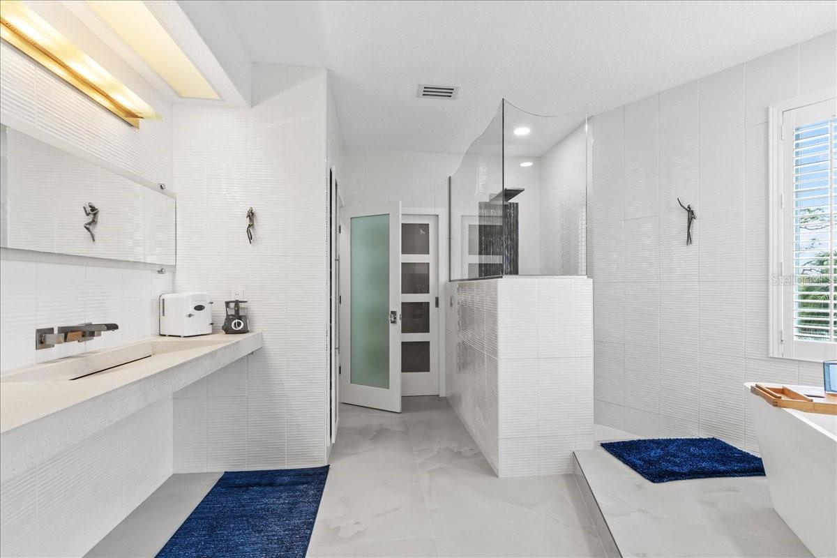 private water closet, wak in closet & walk in shower complete the ensuite